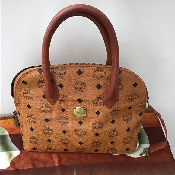 MCM Handbags - Vintage Auth MCM handbag with keys and lock